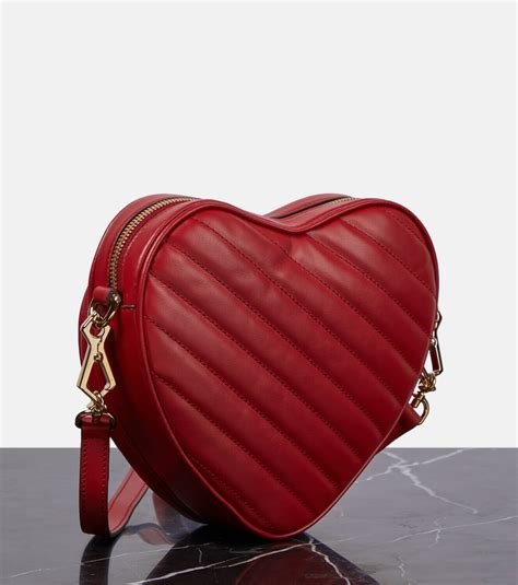 gucci heart bag pink|Gucci heart shaped bag.